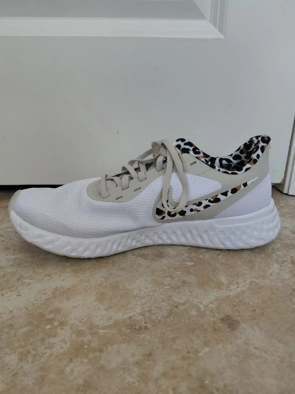 Nike Revolution Cheetah Detailed Running Shoe